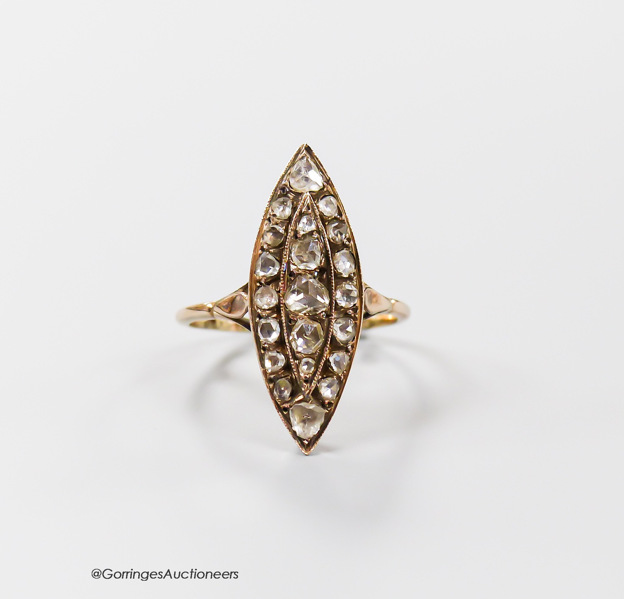 An antique continental yellow metal and rose cut diamond cluster set marquise shape dress ring, size J/K, gross 3 grams.